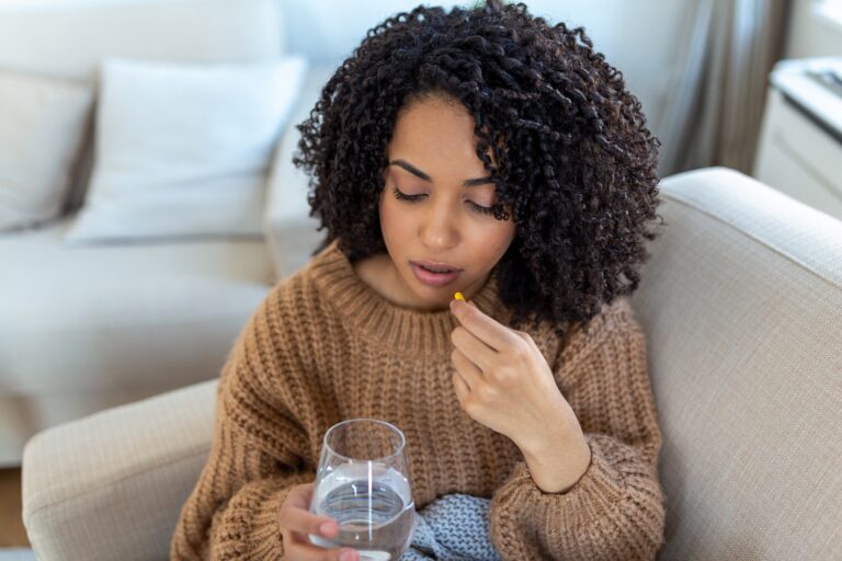 Woman Taking Pill