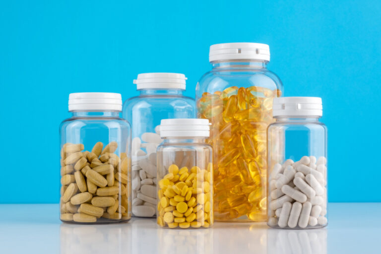 5 clear jars full of different pills to symbolize the best over the counter weight loss pills